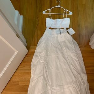 DISSH Aisle white linen maxi skirt and pleated crop top.